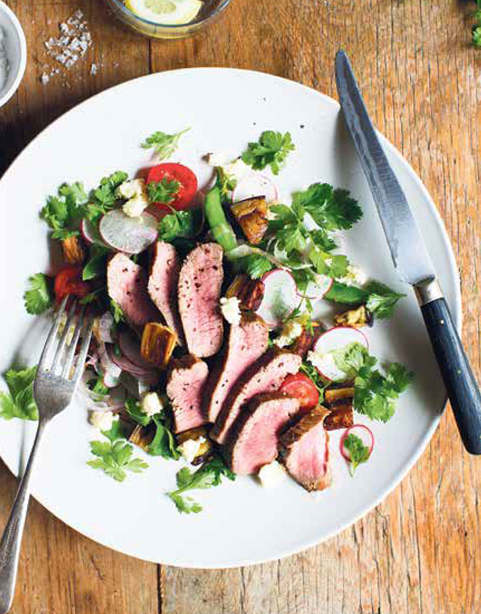 Shortloin of lamb with roasted eggplant and green bean, radish and cherry tomato salad