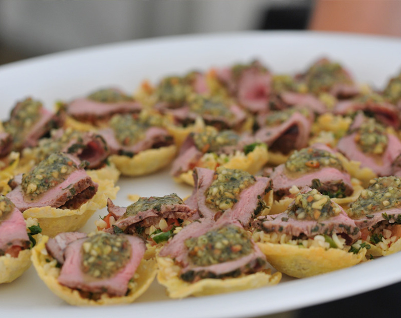 Char-Grilled Coastal Lamb Rump on a Tabbouli-Filled Tuile Topped with Cashew Nut and Mint Pesto